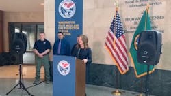 Washington Public Lands Commissioner Hilary Franz unveils her proposed 10-year, $55 million plan to deal with state wildfires during a press conference Thursday.