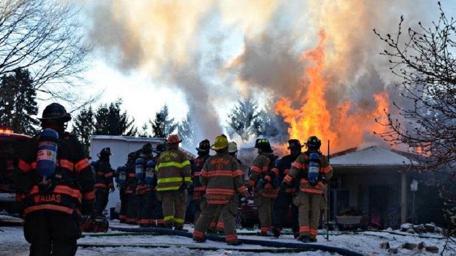 Peebles District firefighters on scene during a fire at a home in McCandless, PA, on Sunday, Jan. 27, 2019.