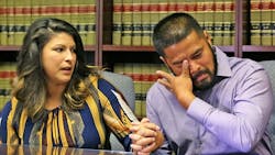 Orlando Police Officer Gerry Realin, right, wipes tears from his eyes as his wife Jessica speaks during an interview on Aug. 11, 2016, nearly two months after the Pulse nightclub shooting in Orlando, FL. Officer Realin, who was on the Hazmat team that had to remove all the bodies from the club, has dealt with PTSD and blood pressure so high he was admitted to a hospital. Orlando Police Officer Gerry Realin, right, wipes tears from his eyes as his wife Jessica speaks during an interview on Aug. 11, 2016, nearly two months after the Pulse nightclub shooting in Orlando, FL. Officer Realin, who was on the Hazmat team that had to remove all the bodies from the club, has dealt with PTSD and blood pressure so high he was admitted to a hospital.
