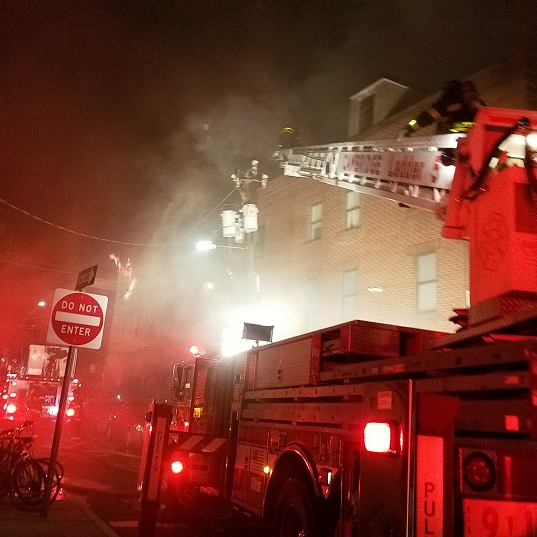 Firefighters struggled with cold temperatures Monday while battling a four-alarm blaze in Cambridge.