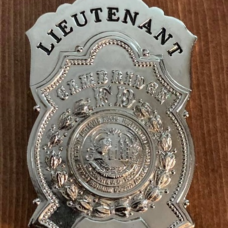 Cambridge, MA, fire Lt. Brandon Hugh Sr. is asking for help finding his father's stolen 1982 badge.