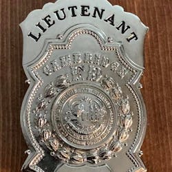 Cambridge, MA, fire Lt. Brandon Hugh Sr. is asking for help finding his father's stolen 1982 badge. Cambridge, MA, fire Lt. Brandon Hugh Sr. is asking for help finding his father's stolen 1982 badge.