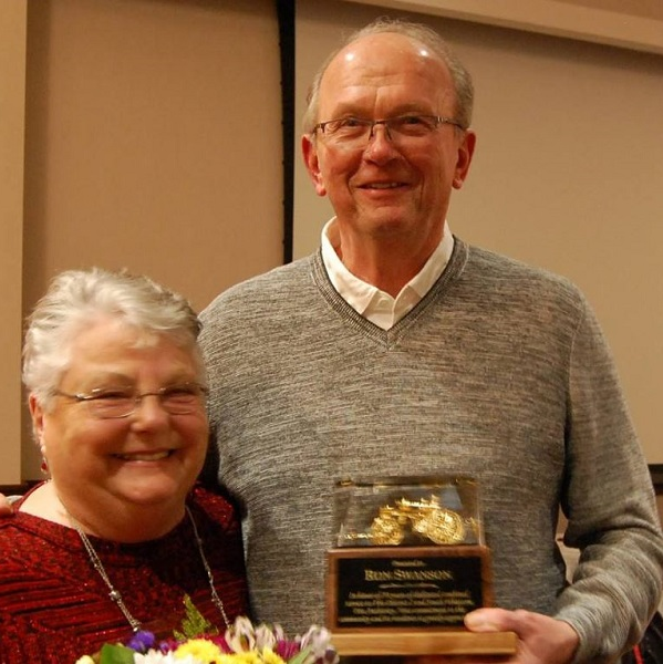 Whatcom County volunteer firefighter Ron Swanson and his wife Sallyjo Bray-Swanson are pictured at a March 2018 ceremony recognizing Swanson's 50 years in the fire service.