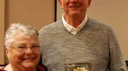 Whatcom County volunteer firefighter Ron Swanson and his wife Sallyjo Bray-Swanson are pictured at a March 2018 ceremony recognizing Swanson's 50 years in the fire service.