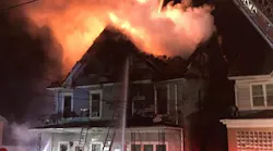 A firefighter suffered second-degree burns to his ears fighting a two-alarm home fire over the weekend in West Hazleton.