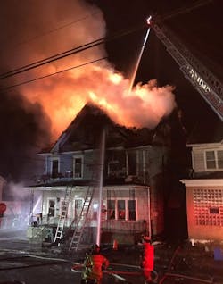 A firefighter suffered second-degree burns to his ears fighting a two-alarm home fire over the weekend in West Hazleton.