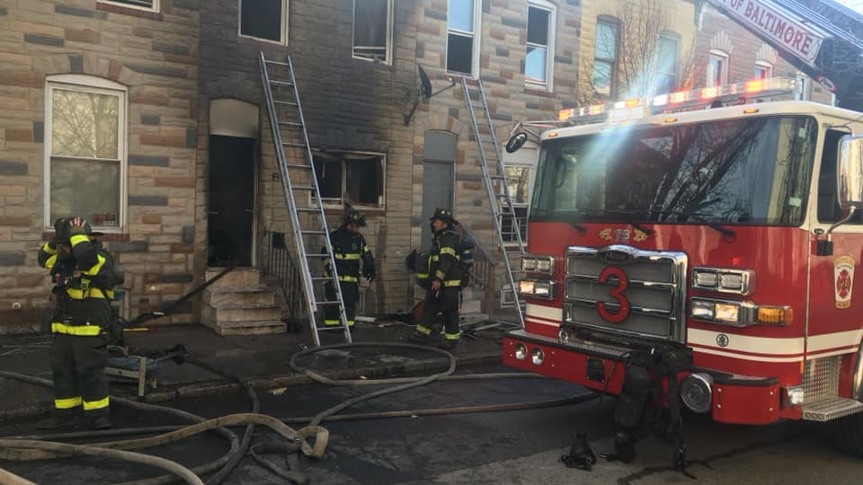 Six Baltimore City firefighters were hospitalized with burns battling a house fire Wednesday in East Baltimore.