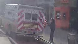 Dashboard camera footage released by the FDNY shows a man pulling an American flag from a parked ambulance on Jan. 25 in Manhattan. Dashboard camera footage released by the FDNY shows a man pulling an American flag from a parked ambulance on Jan. 25 in Manhattan.