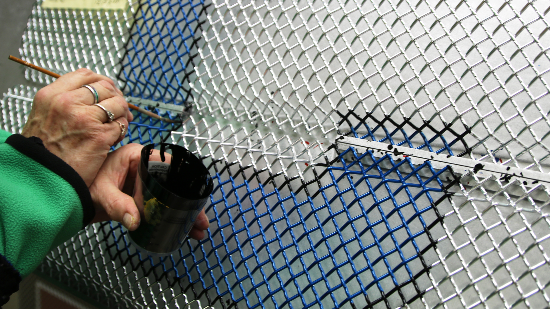 Letters, numbers and images are hand-painted on grills for personalized apparatus.