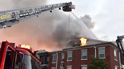 A Jefferson Parish East Bank firefighter suffered burns after falling through an apartment building roof while battling a fire Saturday.