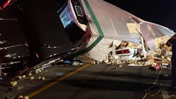 Marion County, FL, firefighters rescued two people trapped in their car after a tractor-trailer flipped on top of it Thursday night. Marion County, FL, firefighters rescued two people trapped in their car after a tractor-trailer flipped on top of it Thursday night.