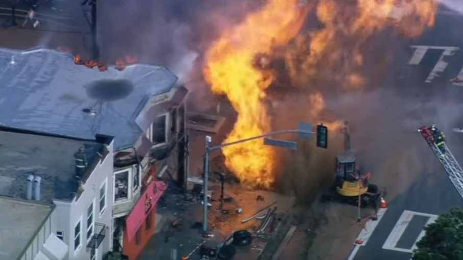 San Francisco firefighters battled flames that shot 40 feet in the air following a gas line explosion.