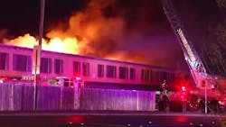 Firefighters rescued two people trapped by smoke and flames on the second floor of a San Antonio apartment complex late Sunday. Firefighters rescued two people trapped by smoke and flames on the second floor of a San Antonio apartment complex late Sunday.