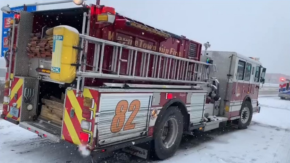 A Wayne Township, IN, firefighter was hurt when a pickup truck hit an apparatus responding to a multiple car accident Sunday.
