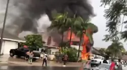 A small airplane crashed into a Yorba Linda, CA, house Sunday, killing five people and injuring a firefighter.