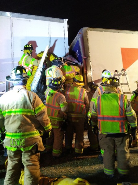 Crews used hydraulic tools and reciprocating saws to cut away parts of the steering column, dash, seat and cab.