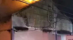 Nearly 40 firefighters from nine departments battled a three-alarm warehouse blaze Wednesday night in Tamarac, FL.