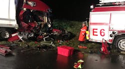 A tractor-trailer struck Engine 6 in the rear, knocking the pumper forward overtop of Clark, pinning him under the unit. A tractor-trailer struck Engine 6 in the rear, knocking the pumper forward overtop of Clark, pinning him under the unit.