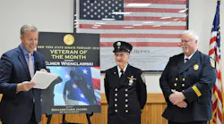 Elmer Wienclawski (center), a 99-year-old veteran and active member of the Brighton Volunteer Fire Department since 1959, was honored by New York state Sen. Chris Jacobs (left) last month.