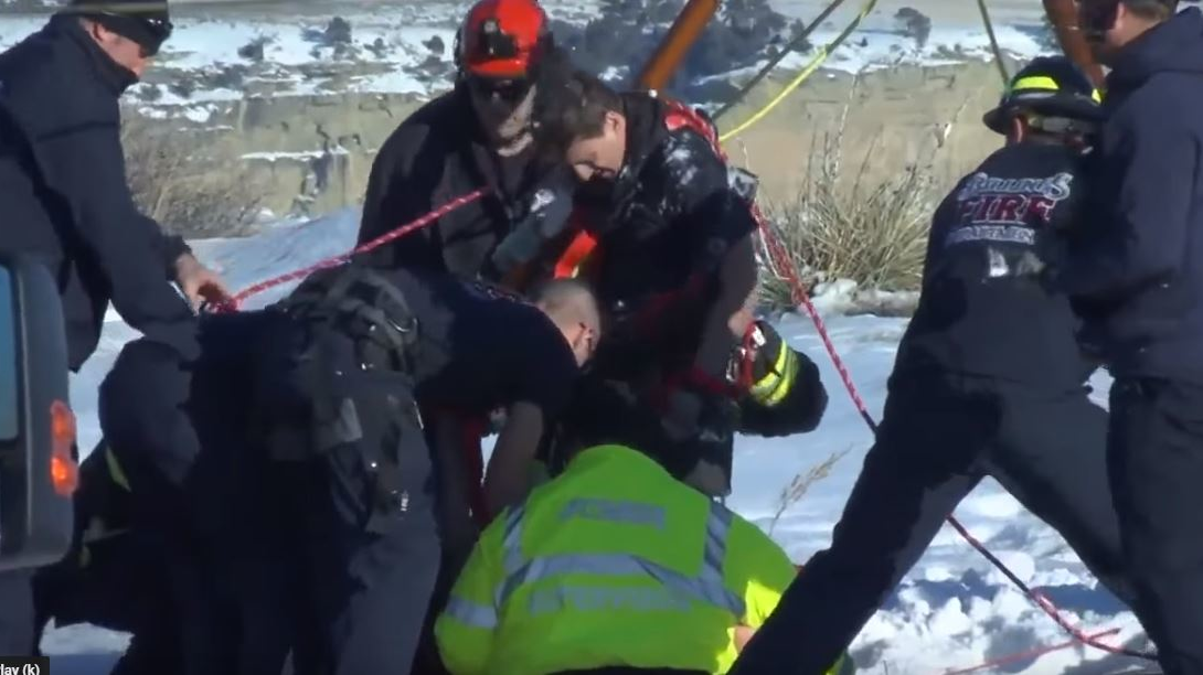 Billings firefighters rescued a boy who fell through a snow-covered crack and became trapped between the rocks Monday.