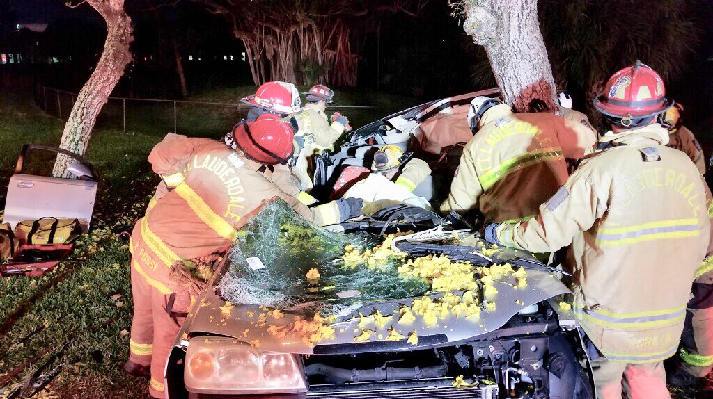 Fort Lauderdale, FL, firefighters cut out a driver from the wreckage of her car following an accident early Saturday.