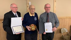 John Pokos, 92 (center), was honored Monday by Pennsylvania State Fire Commissioner Bruce Trego (left) and Somerset County Commissioner Gerald Walker. John Pokos, 92 (center), was honored Monday by Pennsylvania State Fire Commissioner Bruce Trego (left) and Somerset County Commissioner Gerald Walker.