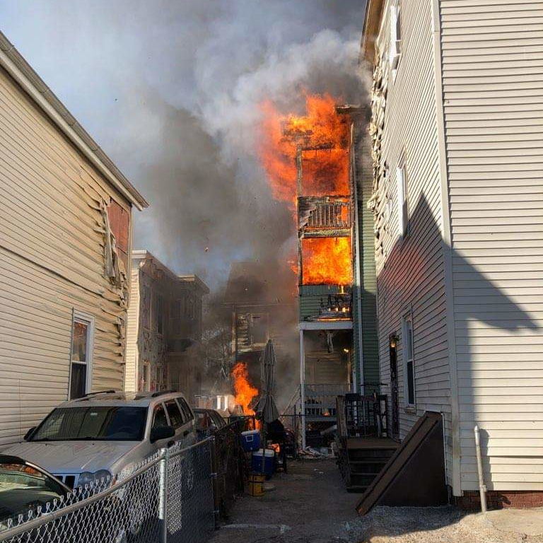 An off-duty Nahant, MA, firefighter led 13 people to safety from a burning building Wednesday.