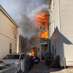 An off-duty Nahant, MA, firefighter led 13 people to safety from a burning building Wednesday.