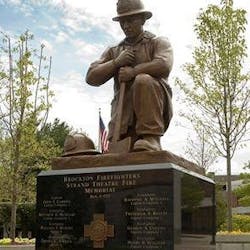 A monument stands in Brockton, MA, to remember the 13 firefighters who died in the Strand Theatre fire on March 10, 1941. A monument stands in Brockton, MA, to remember the 13 firefighters who died in the Strand Theatre fire on March 10, 1941.