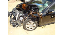 The crushed fender of this 2010 KIA Optima hides everything you need to see for successfully rolling or jacking the dash to free trapped occupants. Moving or removing the fender will provide crews with a clearer picture of the task at hand. Photos by Ron Moore