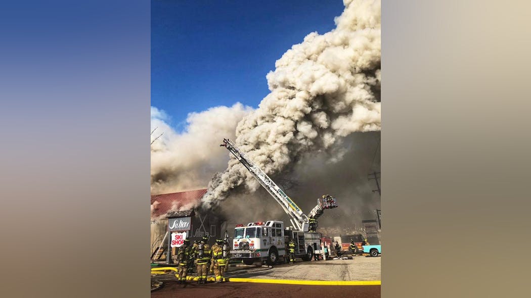 The fire was reported in a ski shop that was part of a complex multi-story structure.