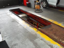 This service pit in the floor of a vehicle service facility is an example of a unique safety consideration for this occupancy.