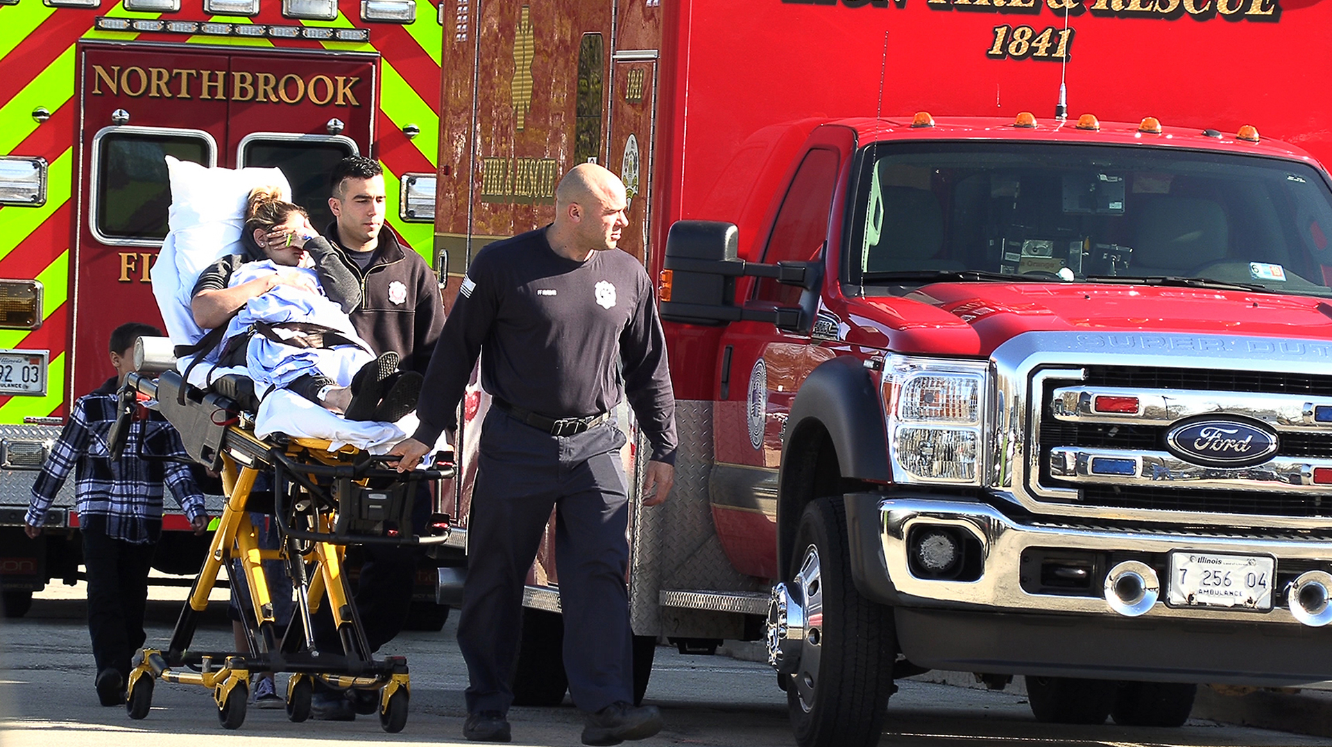 After an ammonia spill Thursday in Beach Park, IL, an injured woman arrives at Vista East Medical Center in Waukegan.