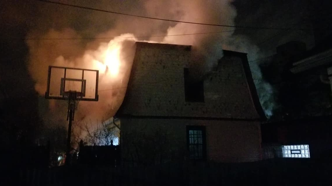 Two Buffalo firefighters were hurt while battling a series of garage fires early Tuesday in the city's Elmwood Village neighborhood.