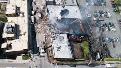 Firefighters fought a building fire after a gas leak lead to an explosion and collapse Wednesday in Durham, NC. Firefighters fought a building fire after a gas leak lead to an explosion and collapse Wednesday in Durham, NC.