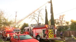 A Fresno firefighter was hit by debris while battling a blaze at at two-story building that killed a person. A Fresno firefighter was hit by debris while battling a blaze at at two-story building that killed a person.