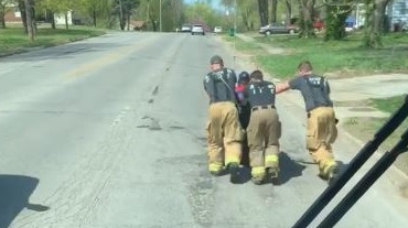 Raytown, MO, firefighters helped a fisherman get home by pushing his electric wheelchair after the chair became stuck and its battery was drained of power.