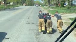Raytown, MO, firefighters helped a fisherman get home by pushing his electric wheelchair after the chair became stuck and its battery was drained of power.