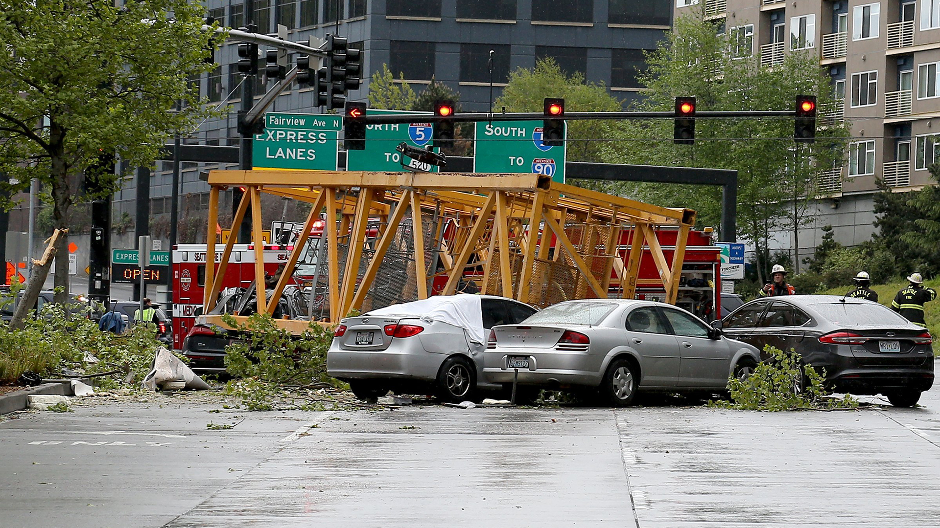 Seattle Emergency crews investigate the scene of a collapsed crane Saturday that's part of a construction project for a new Google campus in the city.