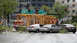 Seattle Emergency crews investigate the scene of a collapsed crane Saturday that's part of a construction project for a new Google campus in the city. Seattle Emergency crews investigate the scene of a collapsed crane Saturday that's part of a construction project for a new Google campus in the city.