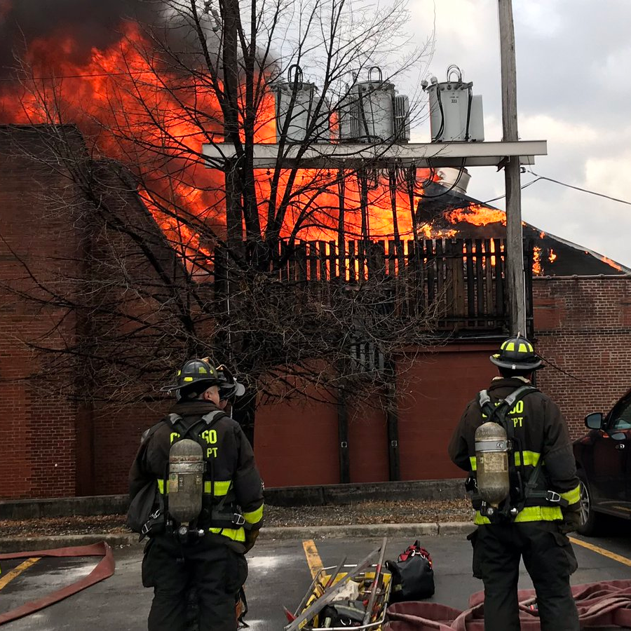 Chicago firefighters battled a five-alarm blaze at a processed food factory Tuesday night.
