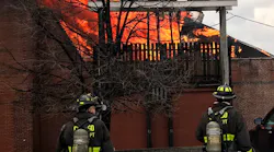 Chicago firefighters battled a five-alarm blaze at a processed food factory Tuesday night.