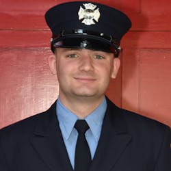 Aric Tegtmeier, whose father, Paul, was an FDNY firefighter who died in the Sept. 11 attacks, graduates from the fire academy Thursday.