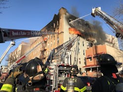 Nearly two dozen FDNY firefighters were injured battling a six-alarm blaze at a Brooklyn apartment building Wednesday.