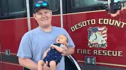 DeSoto County, FL, firefighter Brad Gregrich with his son.