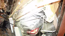 A building in Brooklyn partially collapsed Monday after a car crashed into it.
