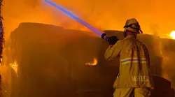 Flames shot as high as three stories in a fire at a dairy Farm that broke out Tuesday night and is likely to last several days.