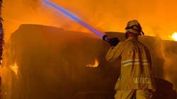 Flames shot as high as three stories in a fire at a dairy Farm that broke out Tuesday night and is likely to last several days. Flames shot as high as three stories in a fire at a dairy Farm that broke out Tuesday night and is likely to last several days.