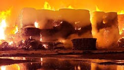 Flames shot as high as three stories in a fire at a dairy Farm that broke out Tuesday night and is likely to last several days. Flames shot as high as three stories in a fire at a dairy Farm that broke out Tuesday night and is likely to last several days.