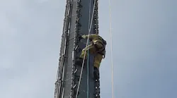 Gwinnett County, GA, firefighters rescued an injured worker who was dangling 100 feet above the ground on a cell tower.